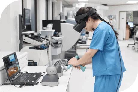 Medical student practising a procedure with a VR headset